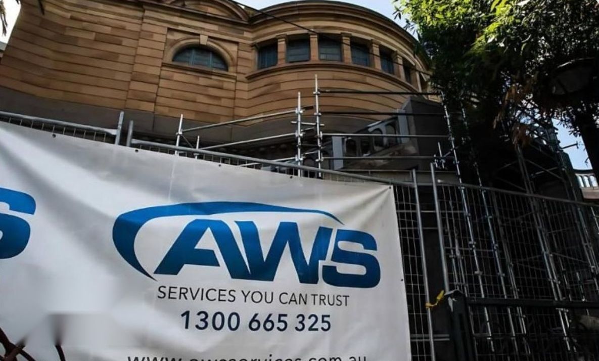 AWS Services banner on scaffolding at a heritage building on Flinders Street